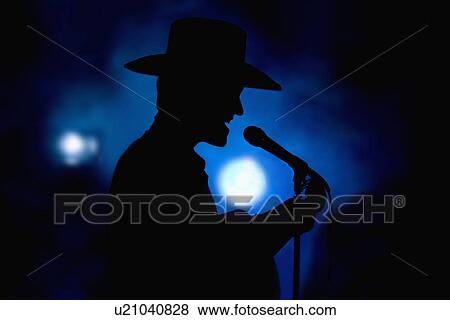 Stock Photo - Country singer on stage. Fotosearch