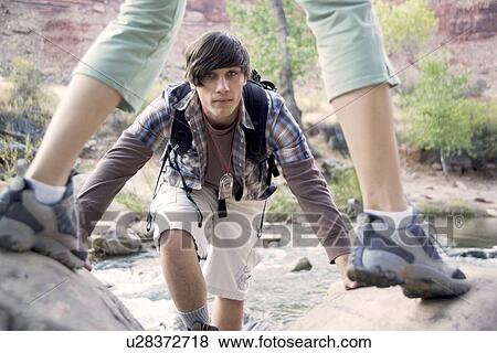 Stock Photo - Couple hiking in Zion National Park Utah USA. Fotosearch