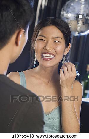 Stock Image - Couple in a nightclub. Fotosearch