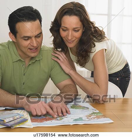 Couple planning a trip View Large Photo Image Picture - Couple planning a trip. Fotosearch