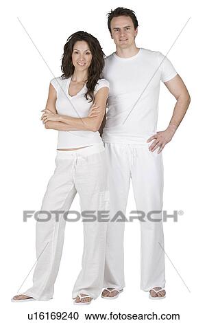 Couple relaxing in loungewear View Large Photo Image Stock Image - Couple relaxing in loungewear. Fotosearch