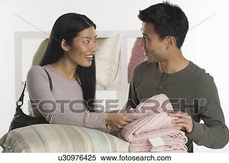 Stock Photography - Couple shopping together. Fotosearch