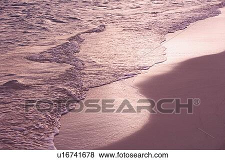 Stock Photo - Deserted beach scene. Fotosearch