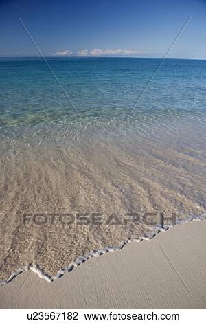 Stock Image - Deserted tropical beach. Fotosearch
