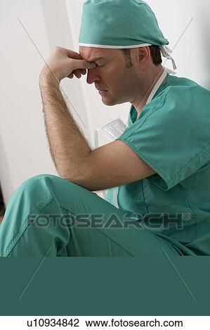 Doctor under stress View Large Photo Image Stock Image - Doctor under stress. Fotosearch
