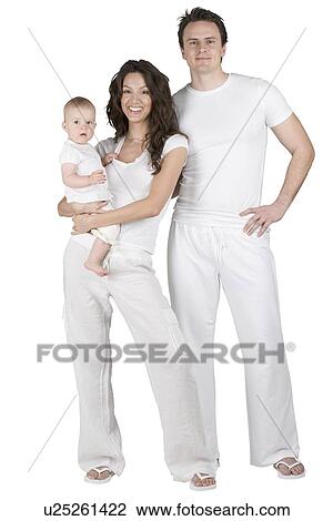 Stock Image - Family relaxing in loungewear. Fotosearch