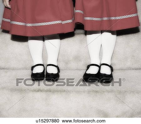 Feet and legs of two girls View Large Photo Image Stock Image - Feet and legs of two girls. Fotosearch
