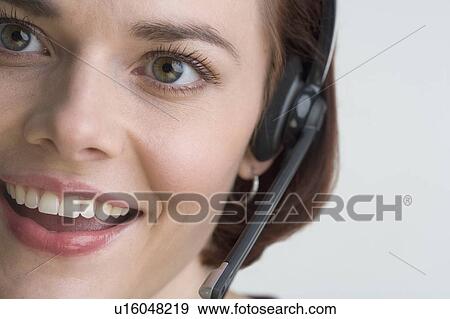 Stock Photo - Female customer service representative. Fotosearch