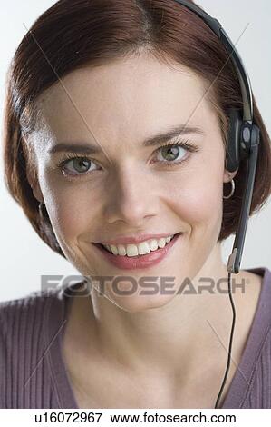 Stock Photo - Female customer service representative. Fotosearch