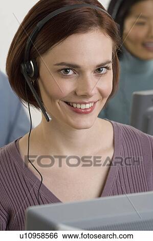 Female customer service representative View Large Photo Image Stock Photograph - Female customer service representative. Fotosearch