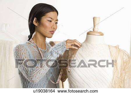 Female fashion designer View Large Photo Image Picture - Female fashion designer. Fotosearch