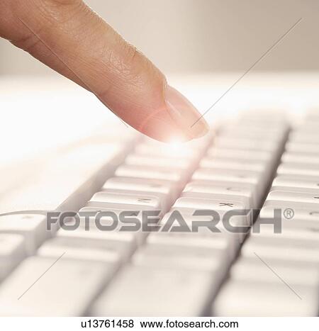 Finger and computer keyboard View Large Photo Image Stock Photo - Finger and computer keyboard. Fotosearch