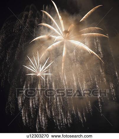 Stock Image - Fireworks in the night sky. Fotosearch
