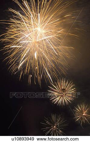 Stock Photo - Fireworks in the night sky. Fotosearch