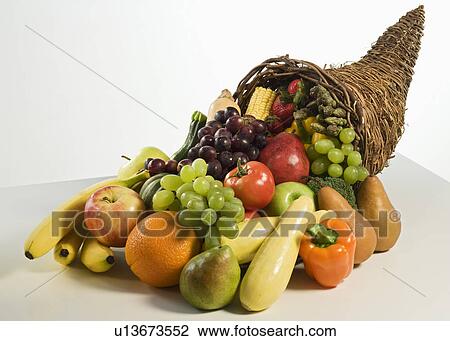 Fruits and vegetables in cornucopia basket View Large Photo Image Stock Image - Fruits and vegetables in cornucopia basket. Fotosearch