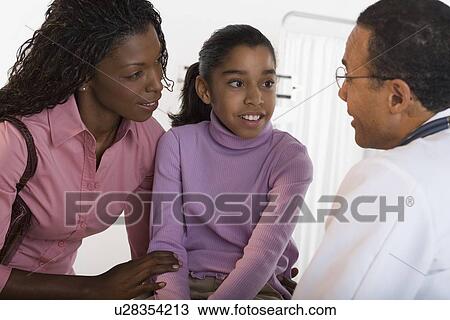Girl getting check up from pediatrician View Large Photo Image Stock Image - Girl getting check up from pediatrician. Fotosearch