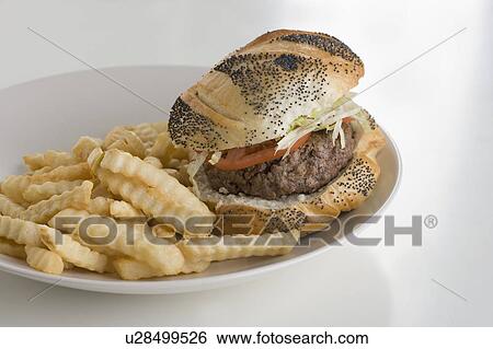 Stock Photograph - Hamburger and French fries. Fotosearch