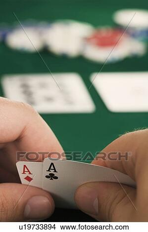 Hand holding two aces View Large Photo Image Picture - Hand holding two aces. Fotosearch