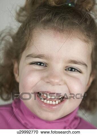 Stock Image - Happy young girl. Fotosearch
