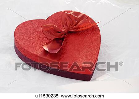 Stock Photography - Heart shaped box of chocolates. Fotosearch