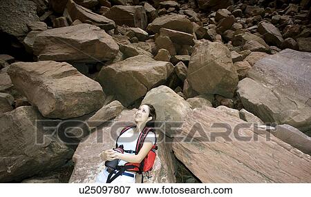 Stock Photo - Hiker basking in sunshine. Fotosearch