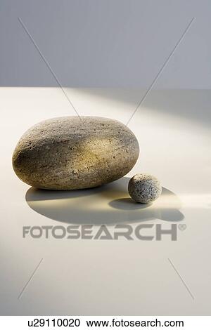 Stock Image - Large and small stone indoors . Fotosearch