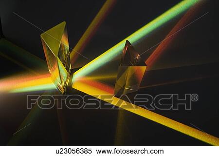 Stock Photography - Light passing through two prisms. Fotosearch