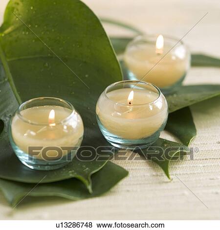 Stock Photo - Lighted candles. Fotosearch