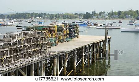 Lobster traps on a dock Maine View Large Photo Image Stock Image - Lobster traps on a dock Maine. Fotosearch