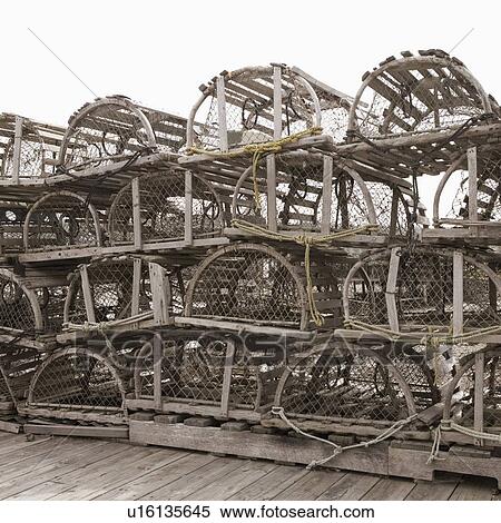 Lobster traps on dock in Maine View Large Photo Image Stock Photography - Lobster traps on dock in Maine. Fotosearch
