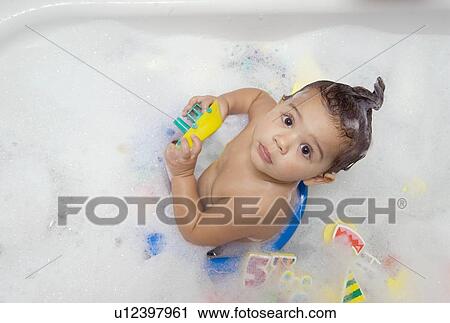 Looking down at a baby bathing View Large Photo Image Stock Image - Looking down at a baby bathing. Fotosearch