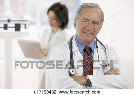 Stock Image - Male and female healthcare professionals. Fotosearch