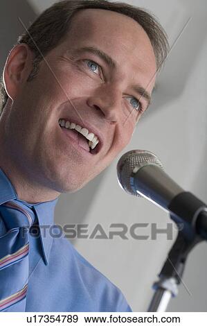 Stock Photo - Man giving a speech. Fotosearch