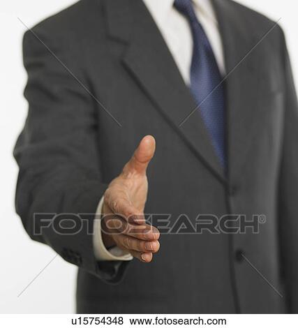 Stock Photo - Man offering handshake. Fotosearch