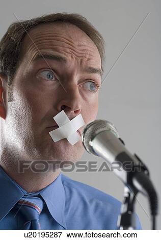 Stock Photo - Man prevented from speaking. Fotosearch