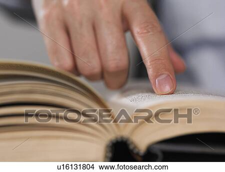 Man reading a book View Large Photo Image Picture - Man reading a book. Fotosearch