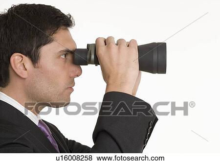 Man with binoculars View Large Photo Image Stock Photo - Man with binoculars. Fotosearch