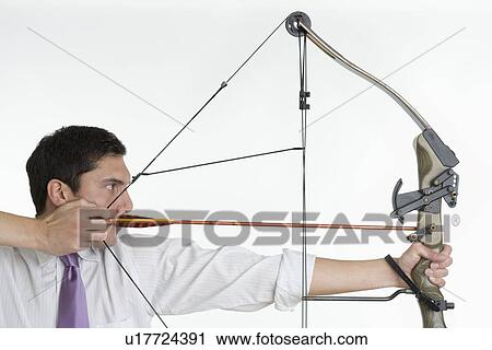 Stock Image - Man with bow and arrow. Fotosearch