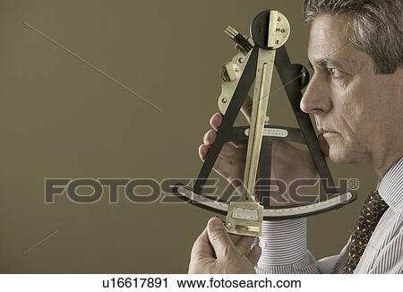 Man with octant View Large Photo Image Stock Image - Man with octant. Fotosearch