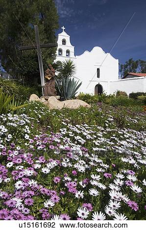 Stock Image - Meadow with church in background, Mission San Diego de Alcala, San Diego, California, United States. Fotosearch