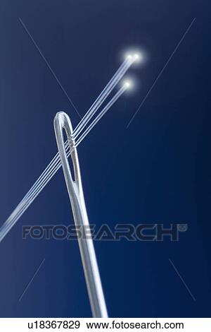 Stock Photo - Needle with fiber optic threads. Fotosearch