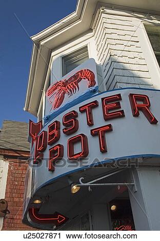 Stock Image - Neon sign for Lobster Pot restaurant. Fotosearch