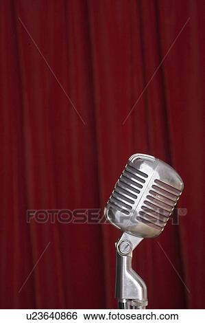 Old fashioned microphone with red curtain View Large Photo Image Stock Photograph - Old fashioned microphone with red curtain. Fotosearch