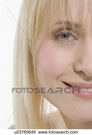 Stock Photo - Partial view of smiling woman's face. Fotosearch
