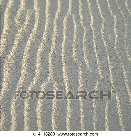 Stock Photo - Patterns of wind-blown sand. Fotosearch