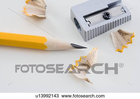 Pencil and sharpener with shavings View Large Photo Image Stock Image - Pencil and sharpener with shavings. Fotosearch