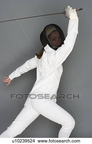 Person engaged in fencing View Large Photo Image Picture - Person engaged in fencing. Fotosearch