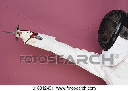 Person engaged in fencing View Large Photo Image Stock Image - Person engaged in fencing. Fotosearch