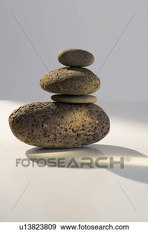 Pile of four stones View Large Photo Image Stock Photo - Pile of four stones. Fotosearch