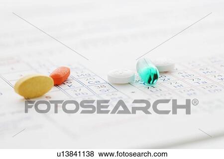 Pills on table of elements View Large Photo Image Stock Photo - Pills on table of elements. Fotosearch